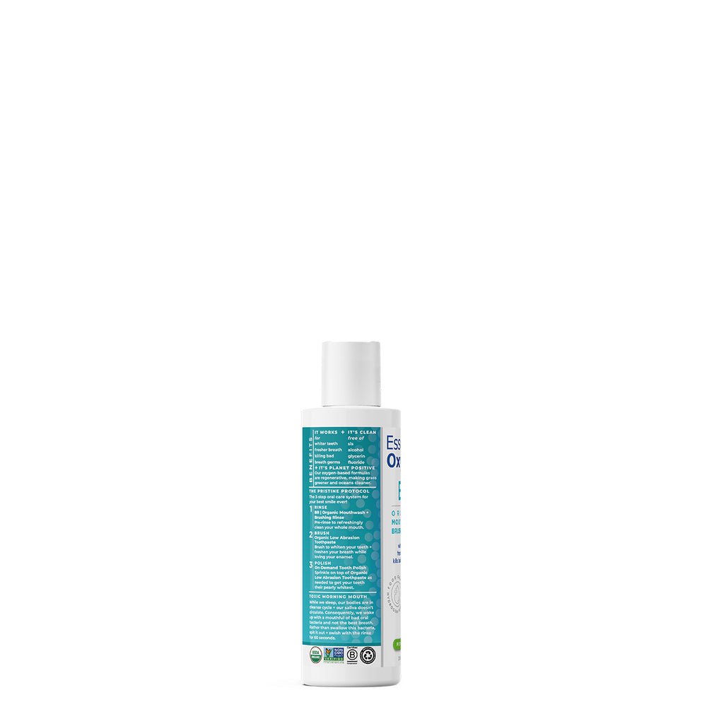 MHP Essential Oxygen Brushing Rinse 3 oz dietary supplement bottle with label promoting fresh breath and oral health.