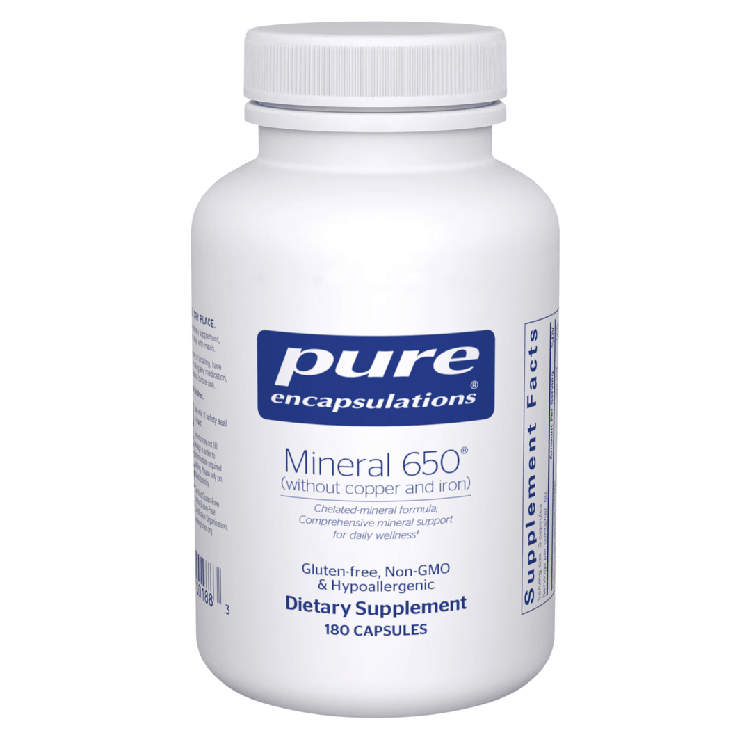 Bottle of Pure Encapsulations Mineral 650 dietary supplement capsules without copper and iron, showing 180 capsules in the container.