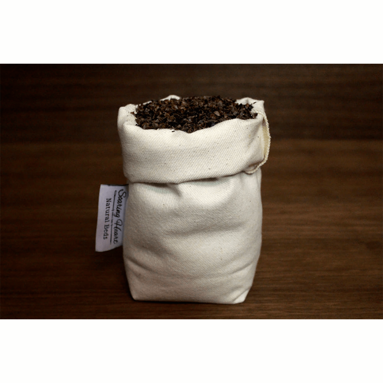 Soaring Heart Buckwheat in a 1-pound bulk supply, natural whole grain with a light brown color and small, triangular grains.