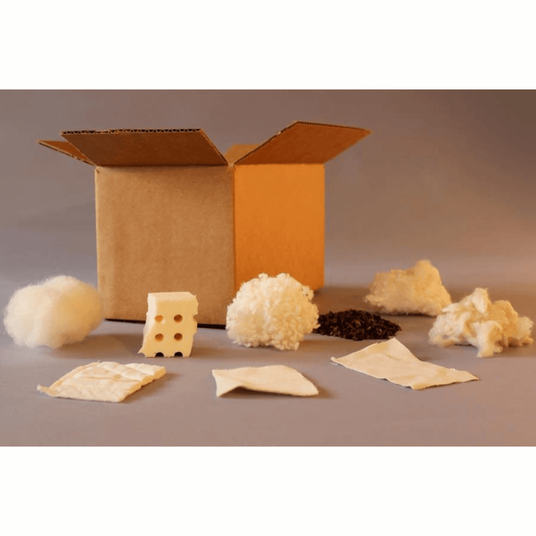 Soaring Heart organic bedding sample box with latex, wool, and cotton bedding materials, shown in a neatly arranged sample collection.