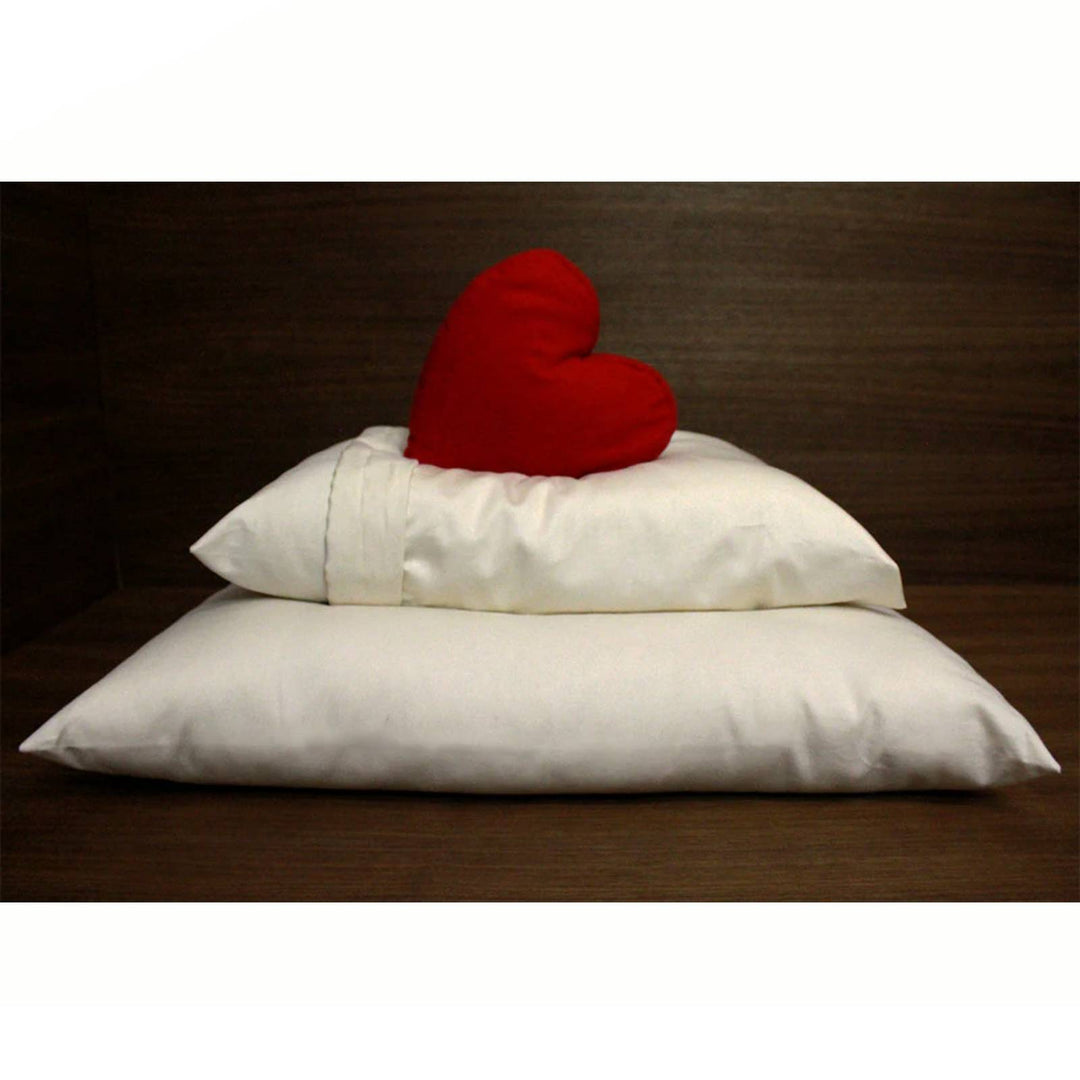 Soaring Heart soft organic wool pillow for kids, 14x20 inches, natural comfort, ideal for travel or relaxation.