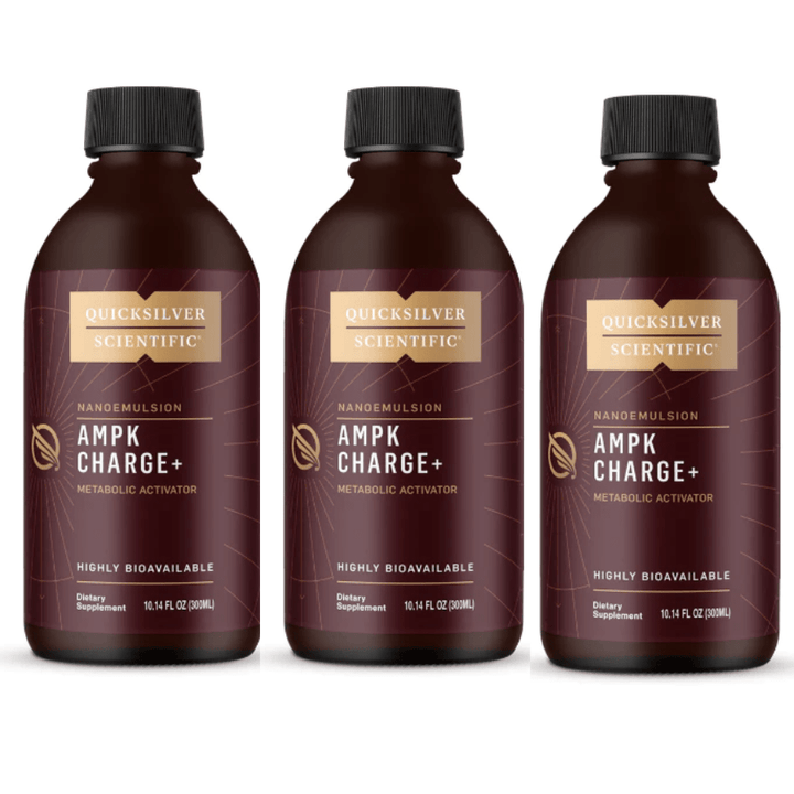 Bundle of three Quicksilver Scientific vitamins and supplements in black bottles, labeled with product details and colorful branding.