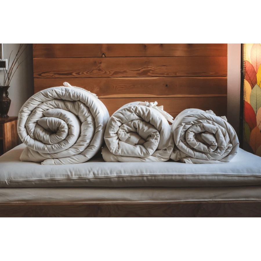 Holy Lamb Organic Wool Comforter in king size, showcasing its plush, extra-warm organic wool filling and soft fabric exterior.